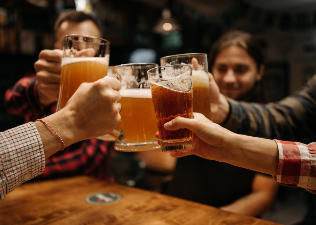 business lessons colleagues toasting with beer 